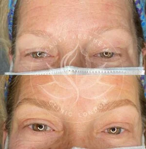 Detailed view of microblading eyebrows, highlighting the natural-looking, perfectly shaped brow strokes created with precision